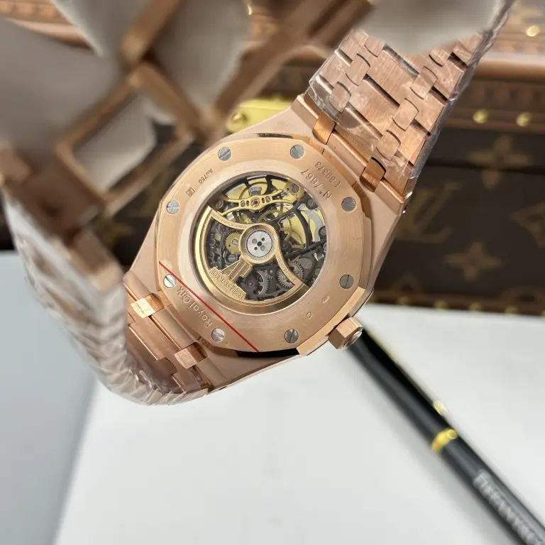 Dong-Ho-Audemars-Piguet-Rep-11-Royal-Oak-Openworked-Frosted-15412-Ma-Vang-Hong-Vien-Dinh-Da-Baguette-41mm-3-768x768.jpg Audemars Piguet Royal Oak Openworked Frosted 15412 Case Rose Gold Bezel Stone Baguette 41mm Super Clone - Image 10