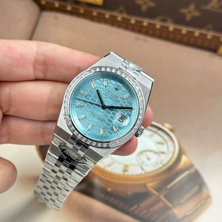 Dong-Ho-Rolex-Land-Dweller-127336-Che-Tac-Mat-Xanh-Bang-Hoa-Tiet-To-Ong-Dinh-Da-Baguette-40mm-3-768x768-1 Land Dweller 127336 DIWF 1:1 Best Edition Ice Blue Textured Dial Diamonds Bezel on SS Bracelet A7135 - Image 7